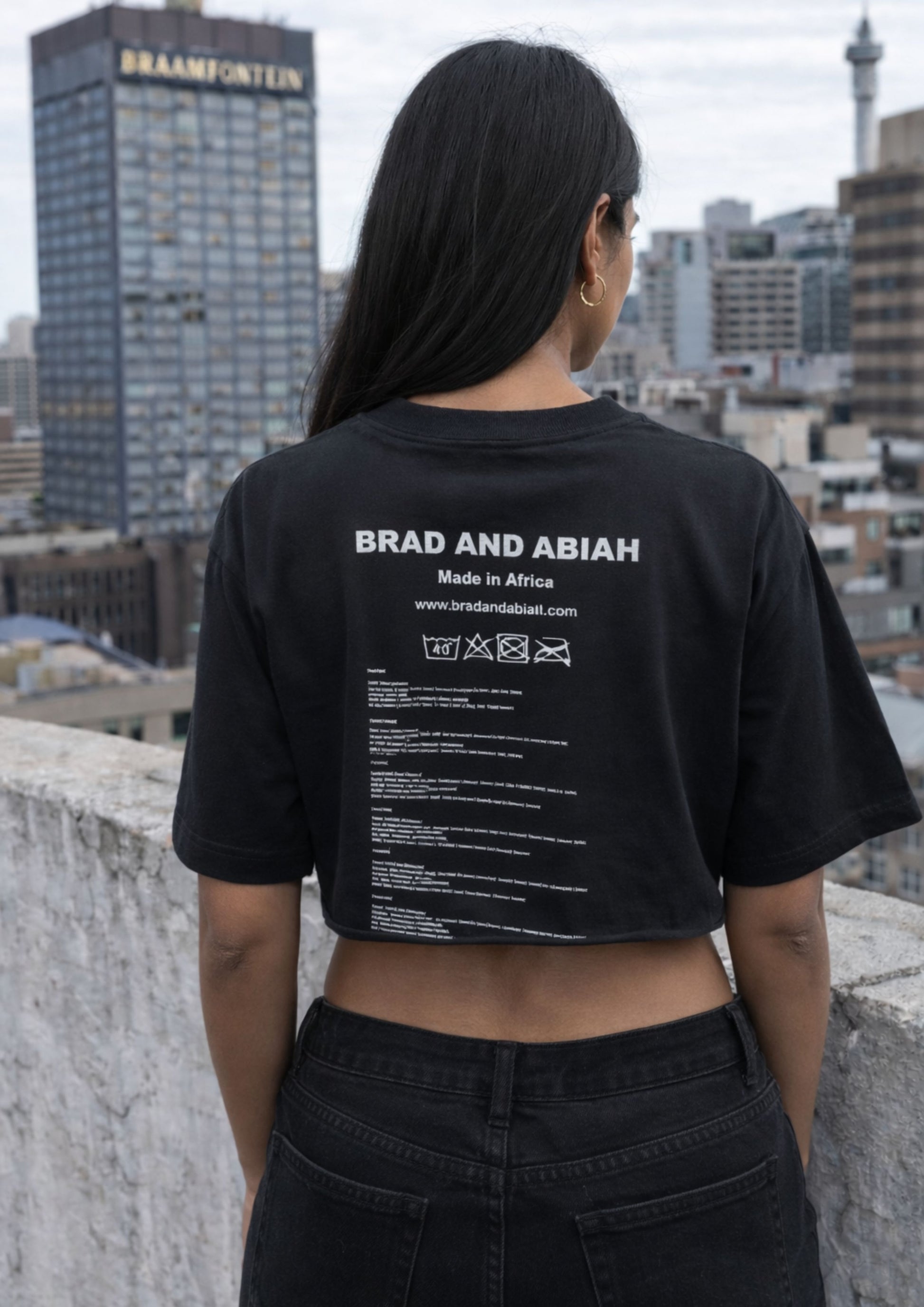 alt="black tiger crop top  graphic tee designer streetwear crop top South Africa Brad & Abiah AMEN Indian African girl"